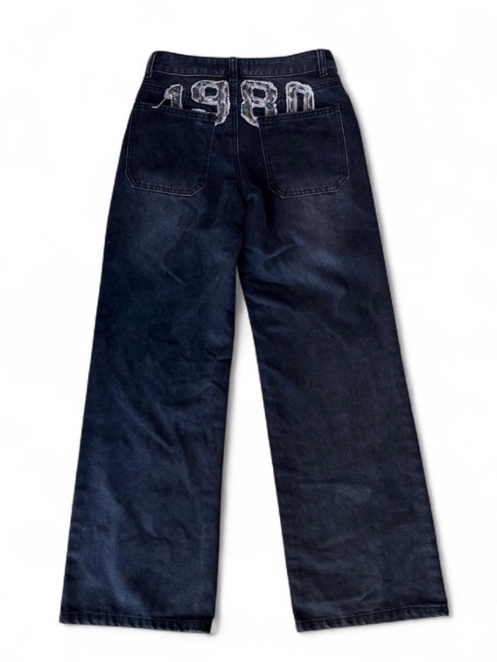 Disclosure jeans with white “1980” on back pockets